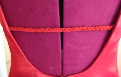 Plaited band on low cut back